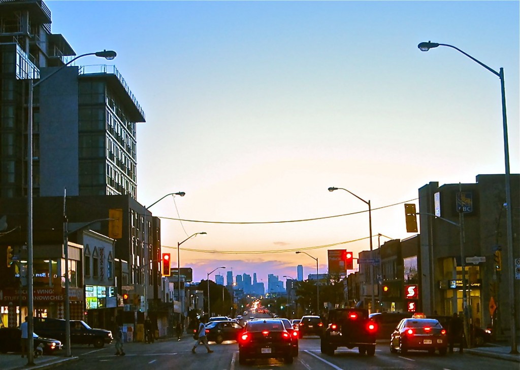 Danforth and Woodbine, looking west on Sept. 16, 2014, 98 year and 51 weeks after the photo below right, Woodbine and Danforth has changed plenty. And after about 60 years in decline, the area is getting new investment and is clearly on the way back.